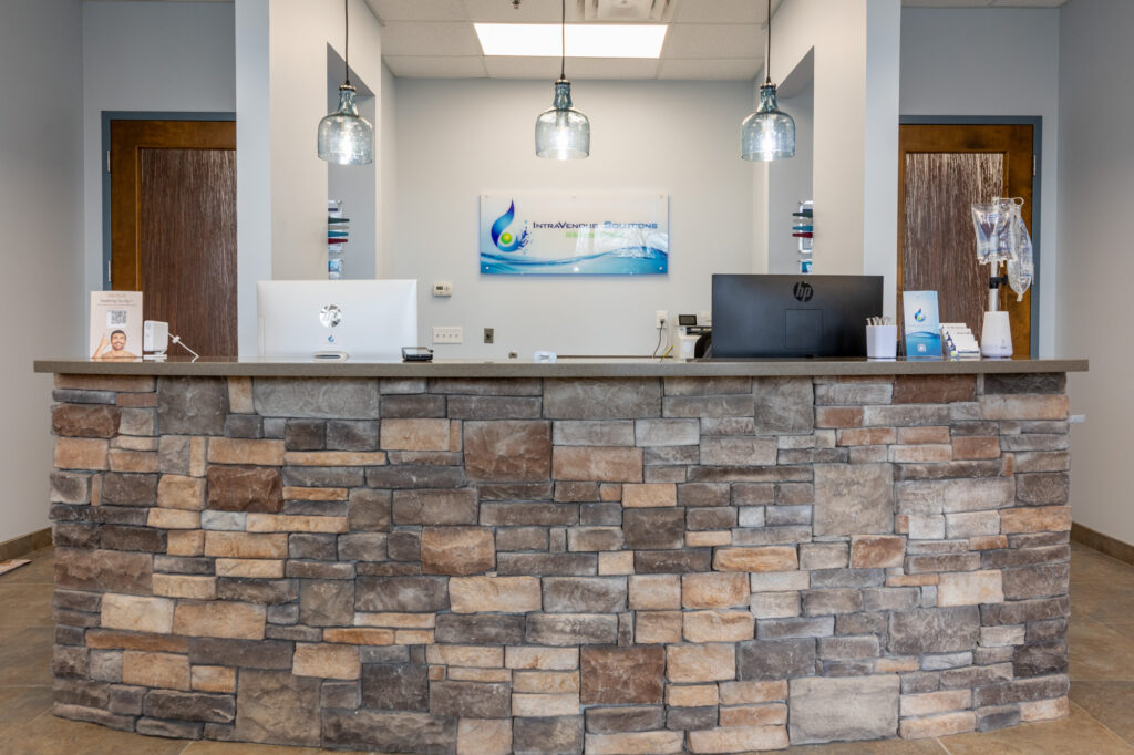 The front desk and reception area of IntraVenous Solutions, a hydration clinic in Hendersonville.