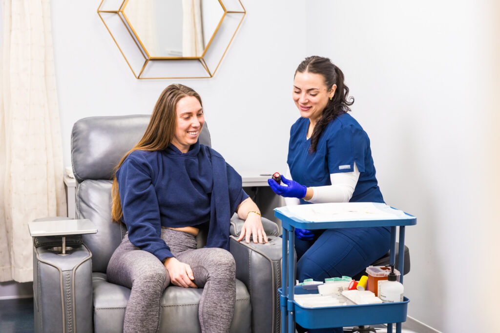 A patient speaks with a nurse at IntraVenous Solutions, who provides vitamin B complex for weight loss in Nashville.